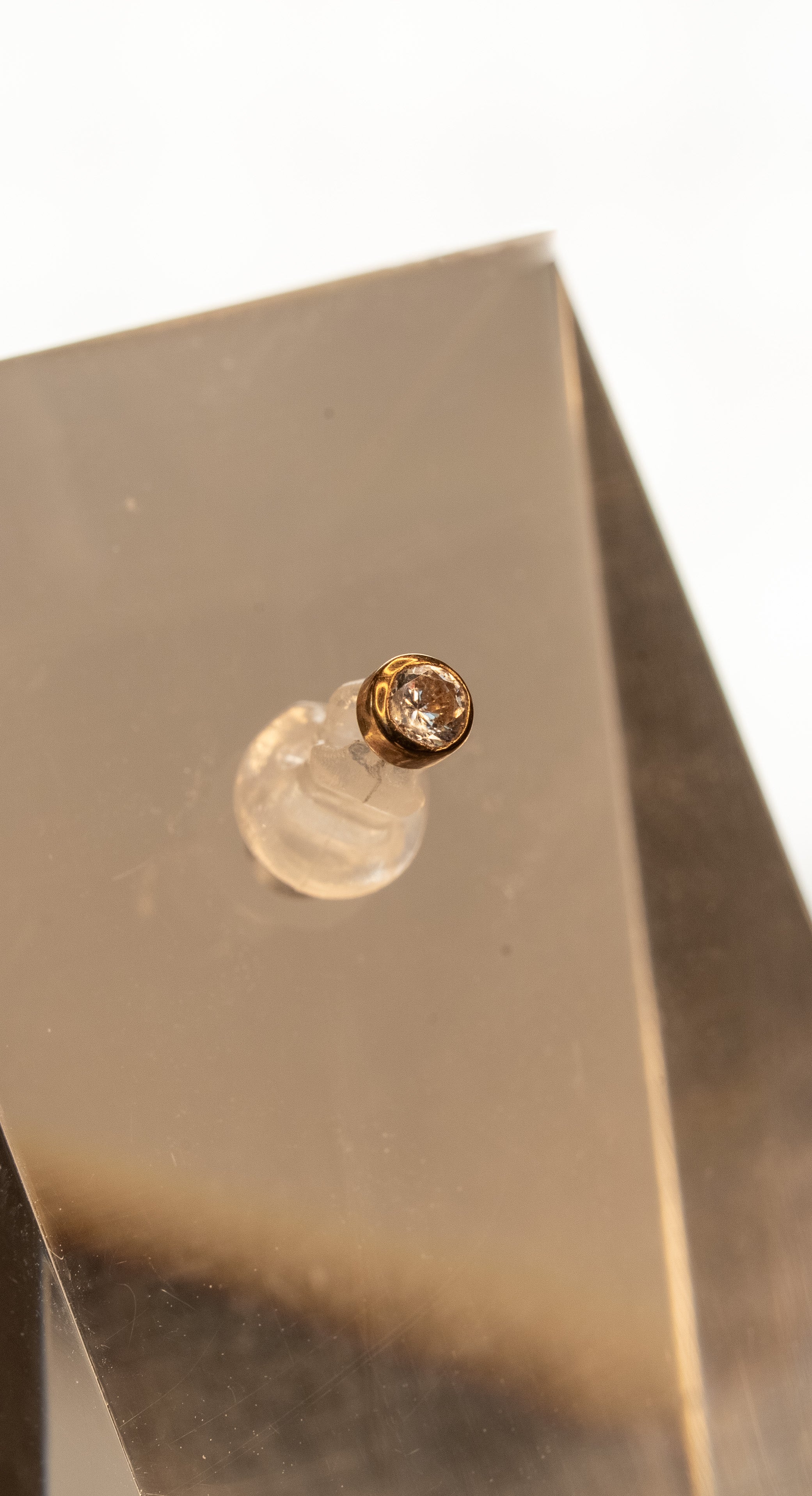 Ponto de luz com zircônia - Ouro 18k